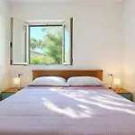 Semesterbostad Villaggio Sabbia D'oro Lupetto