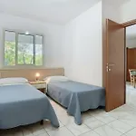Semesterbostad Villaggio Sabbia D'oro Lupetto